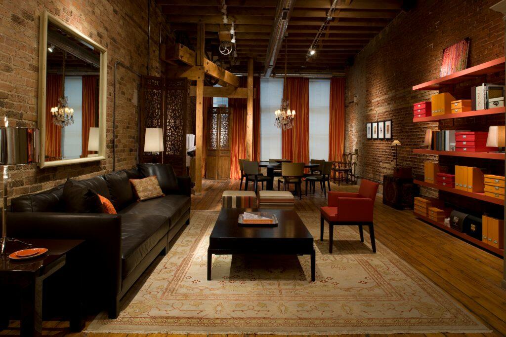 Modern Living Room and Dining Room With Exposed Brick