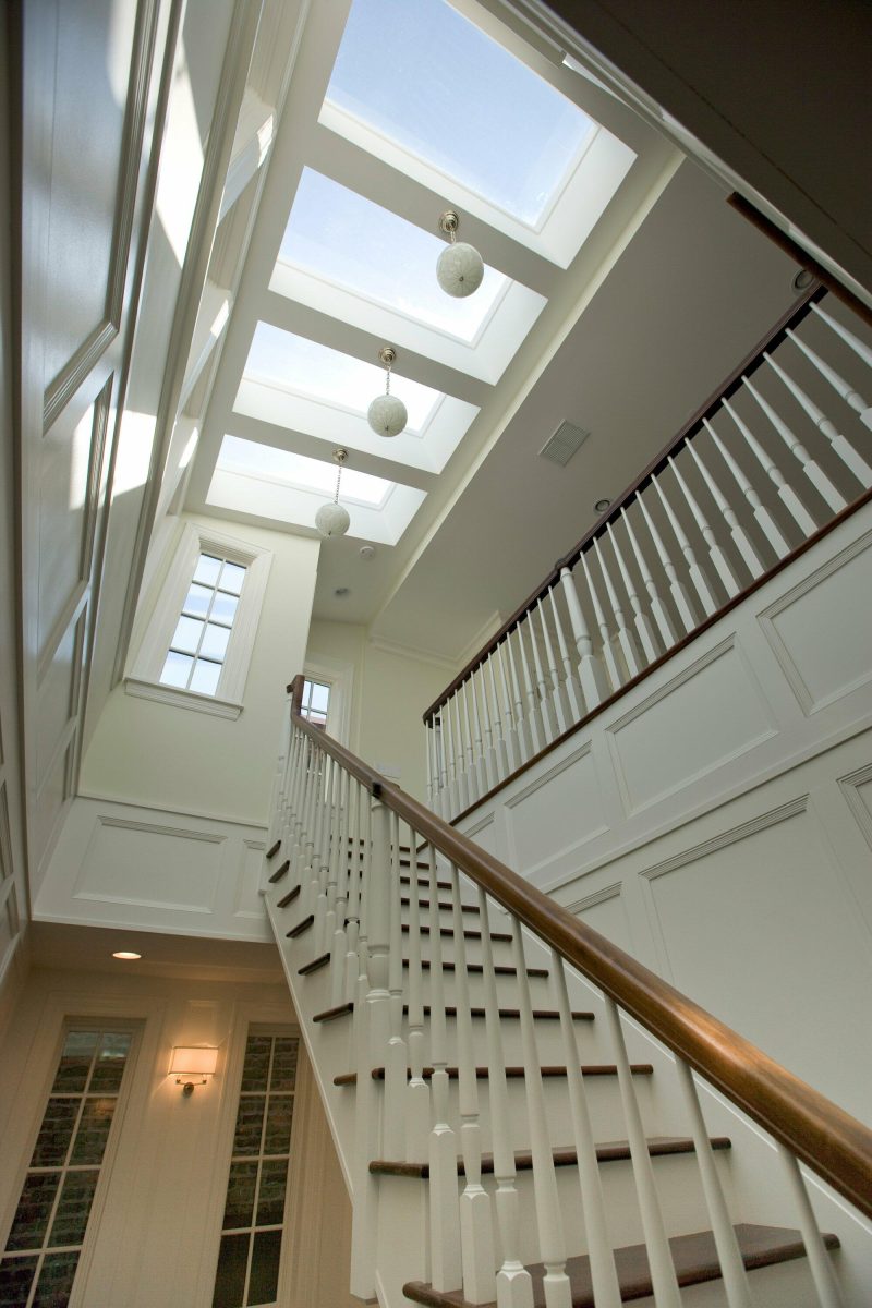 White Staircase and Skylight Design