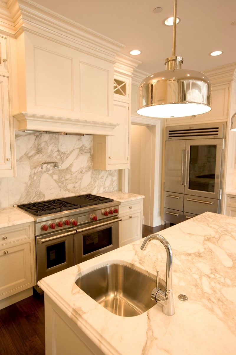 White Custom Kitchen Cabinets and Stainless Steel Appliances